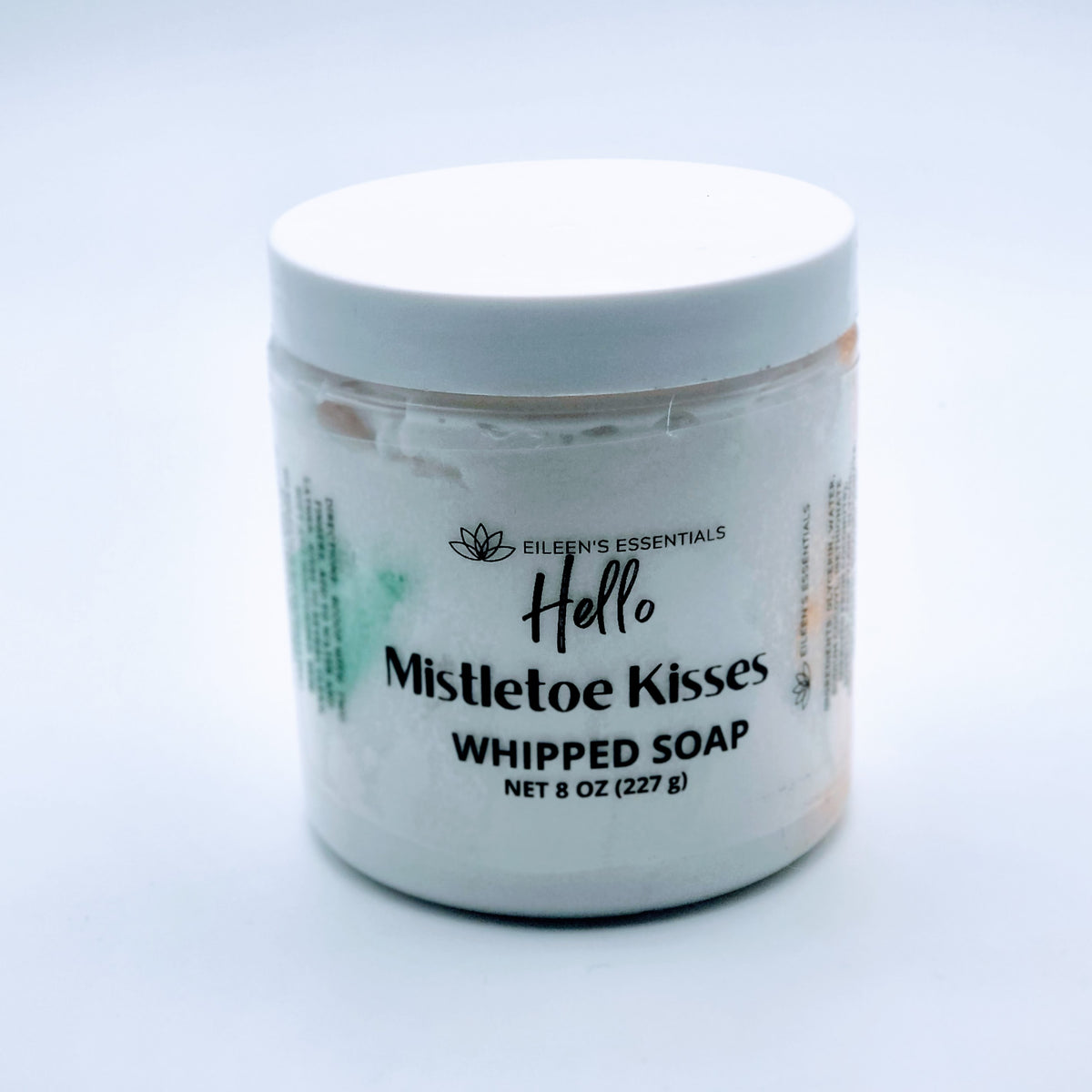 Mistletoe Kisses 8 oz whipped soap jar with a white lid and green accents.