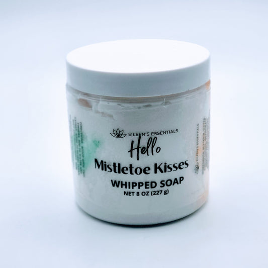 Mistletoe Kisses 8 oz whipped soap jar with a white lid and green accents.